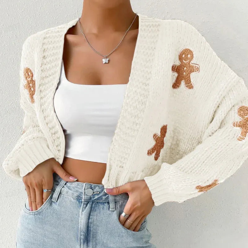 Green knitted cardigan with gingerbread appliqués — cozy holiday women’s sweater